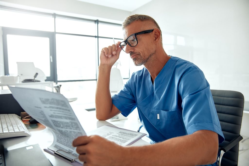 Medical translator editing a document